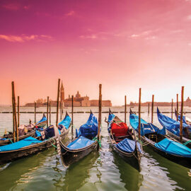 Gondolas after sunset in Venice