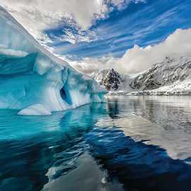 Iceberg floats in Andord Bay on Graham Land, Antarctica.