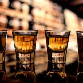 Whiskey shots on bar