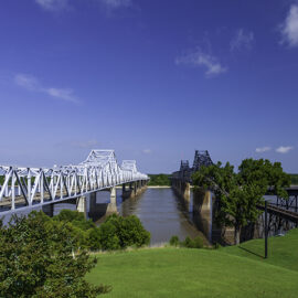 The Old Vicksburg one rail line; and the new Vicksburg Bridge cantilever bridges cross the Mississippi River between Delta, Louisiana and Vicksburg